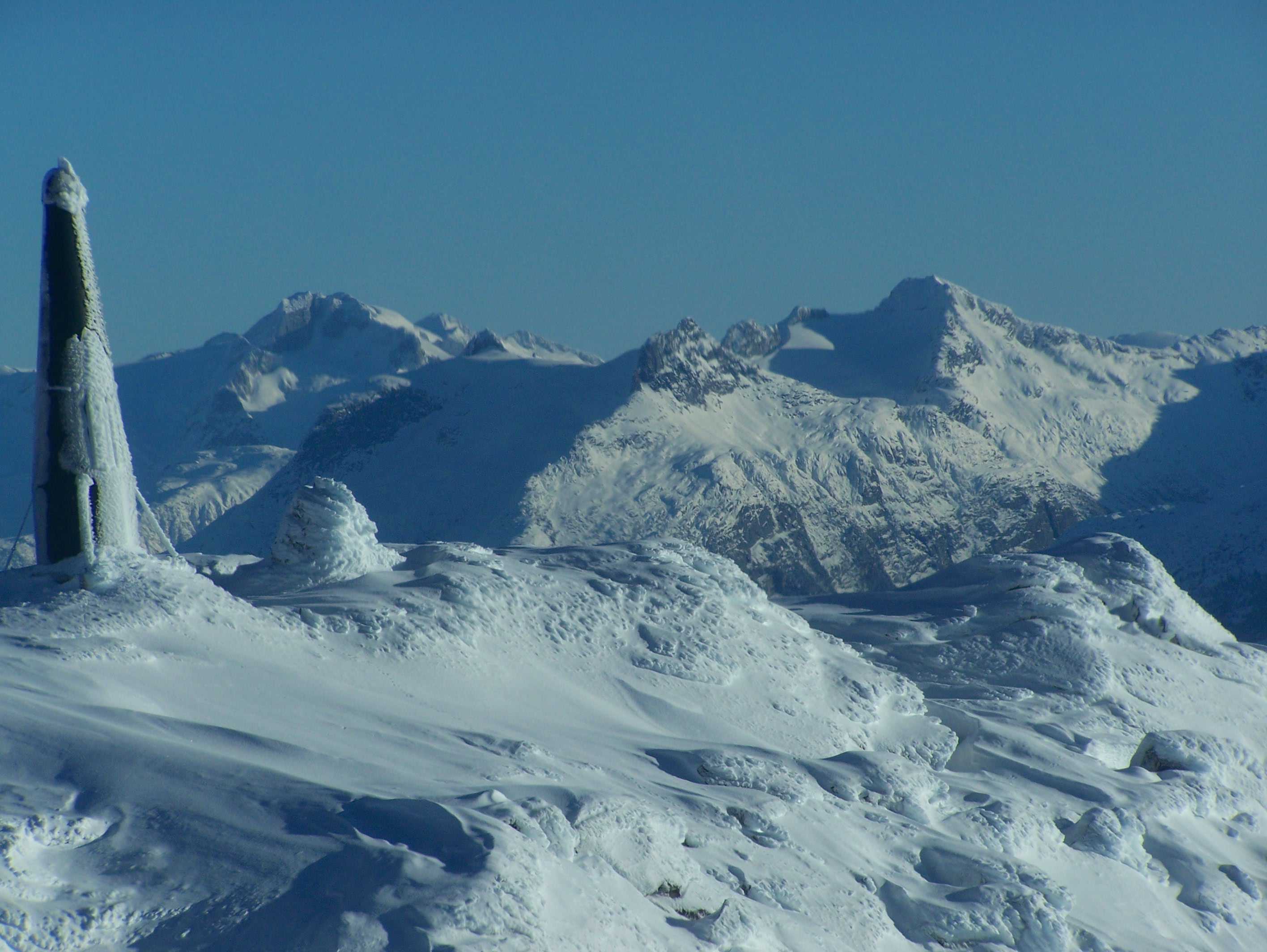Ice-covered antenna on Mount Julian in winter