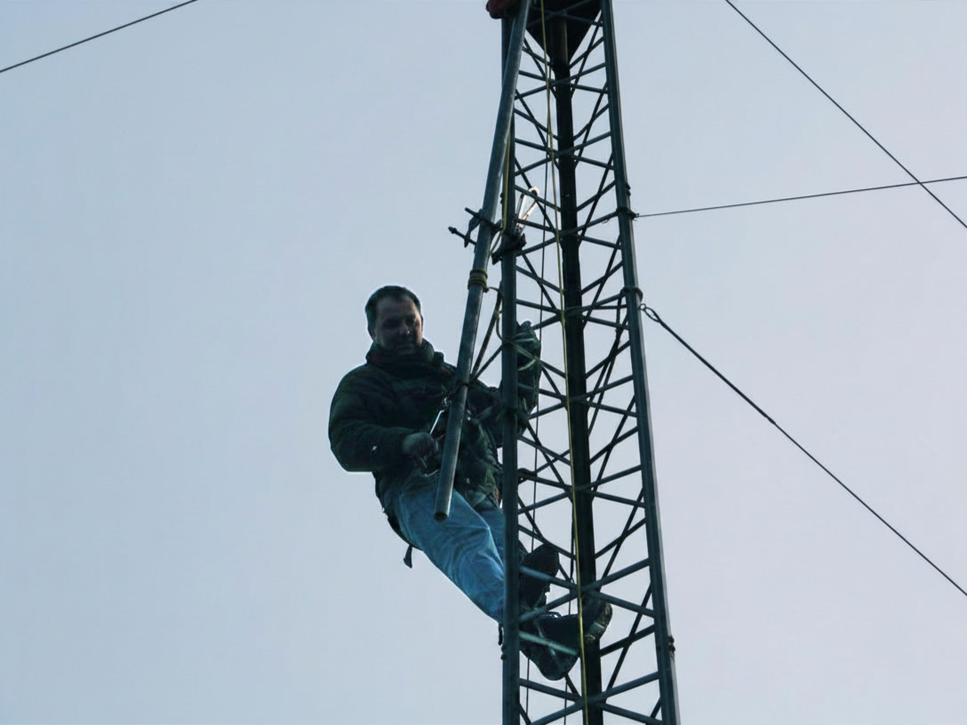 Rob climbing a repeater tower
